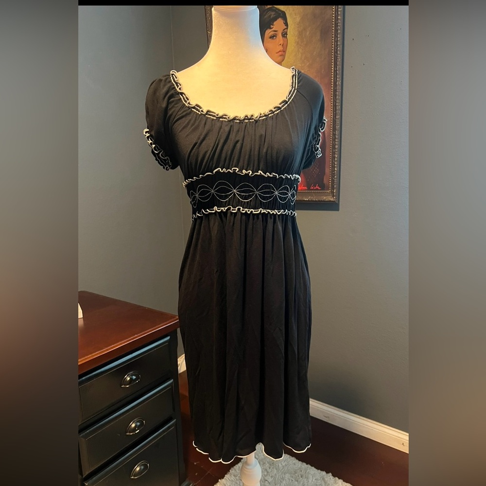 Black dress with elastic at the sleeves and neckline. In EUC. Size S